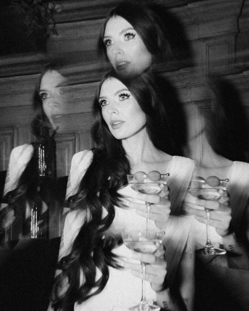 A bride in Scotsman with a cocktail